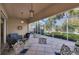 Spacious screened patio with pavers and lush landscaping at 13240 Guyana St, Venice, FL 34293