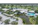 Aerial view of community pool and clubhouse at 135 Braemar Ave, Venice, FL 34293