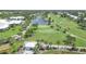 Aerial view showing homes and golf course at 135 Braemar Ave, Venice, FL 34293