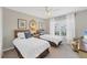 Bedroom with twin beds, nautical decor, and window at 135 Braemar Ave, Venice, FL 34293