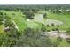 Golf course with water features at 135 Braemar Ave, Venice, FL 34293