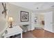 Bright home office with wood floors and access to other rooms at 135 Braemar Ave, Venice, FL 34293