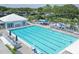 Resort-style pool with plenty of lounge chairs at 135 Braemar Ave, Venice, FL 34293