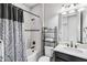 Bathroom with shower/tub combo, vanity, and toilet at 13864 Posada St, Venice, FL 34293