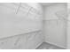 Large walk-in closet with wire shelving at 13864 Posada St, Venice, FL 34293