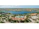Community clubhouse with pool and tennis courts at 13864 Posada St, Venice, FL 34293
