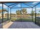 Enjoy the lake view from this screened porch at 13864 Posada St, Venice, FL 34293