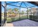 Relaxing screened porch with lake view at 13864 Posada St, Venice, FL 34293