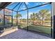Spacious screened porch overlooking a lake at 13864 Posada St, Venice, FL 34293