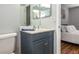 Bathroom with vanity, sink, and toilet at 140 Columbia Rd, Venice, FL 34293