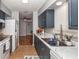 Modern kitchen with updated cabinets, countertops, and a full suite of appliances at 140 Columbia Rd, Venice, FL 34293