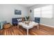 Living area with a comfy sofa and a white coffee table at 140 Columbia Rd, Venice, FL 34293