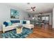 Open living and dining area with hardwood floors and stylish furnishings at 140 Columbia Rd, Venice, FL 34293