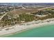 Aerial view of beachfront property near airport, showing beach access and park at 1423 Avenida Del Circo # 1C, Venice, FL 34285
