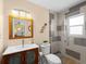 Clean bathroom with modern vanity and walk-in shower at 1423 Avenida Del Circo # 1C, Venice, FL 34285