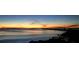 Stunning sunset over calm ocean water at 1423 Avenida Del Circo # 1C, Venice, FL 34285
