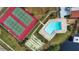 Community pool, tennis courts, and shuffleboard at 1437 57Th W St # 1437, Bradenton, FL 34209