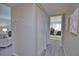 Hallway with access to bedroom and other rooms at 1437 57Th W St # 1437, Bradenton, FL 34209