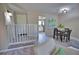 Open living and dining area with modern decor and neutral color palette at 1437 57Th W St # 1437, Bradenton, FL 34209