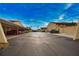 Covered parking area with additional open parking spaces at 1437 57Th W St # 1437, Bradenton, FL 34209