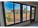 Sunroom with view of backyard and neighboring building at 1437 57Th W St # 1437, Bradenton, FL 34209