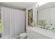 Clean bathroom with white vanity and walk-in shower at 1531 Placida Rd # 1-103, Englewood, FL 34223
