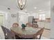 Bright dining area adjacent to kitchen and laundry at 1531 Placida Rd # 1-103, Englewood, FL 34223