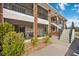 Brick building exterior with balconies and landscaping at 1531 Placida Rd # 1-103, Englewood, FL 34223