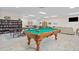 Community game room with pool table and ping pong at 1531 Placida Rd # 1-103, Englewood, FL 34223