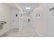 Hallway leading to community spaces at 1531 Placida Rd # 1-103, Englewood, FL 34223
