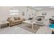 Community lounge with sofas and coffee table at 1531 Placida Rd # 1-103, Englewood, FL 34223