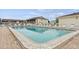 Community pool with plenty of lounge chairs at 1531 Placida Rd # 1-103, Englewood, FL 34223