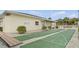Two shuffleboard courts and bench at 1531 Placida Rd # 1-103, Englewood, FL 34223