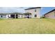 Well-maintained backyard with a large, lush lawn at 1920 Sunset Preserve Way, Port Charlotte, FL 33953