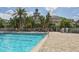Resort-style pool with surrounding patio and clubhouse at 1931 San Silvestro Dr, Venice, FL 34285