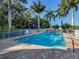 Refreshing community pool with patio and seating at 1931 San Silvestro Dr, Venice, FL 34285
