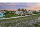 Beachfront home with palm trees and ocean views at 213 The Esplanade S, Venice, FL 34285