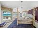 Main bedroom with ocean views and a large bed at 213 The Esplanade S, Venice, FL 34285