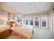 Ocean view bedroom with a playful design and private access to a balcony at 213 The Esplanade S, Venice, FL 34285