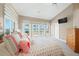 Beachy bedroom with ocean view and ample light at 213 The Esplanade S, Venice, FL 34285
