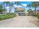 Beachfront home with a two-car garage and balcony at 213 The Esplanade S, Venice, FL 34285