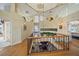 Elegant hallway with a view of the living room below at 213 The Esplanade S, Venice, FL 34285