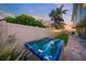 Relaxing hot tub surrounded by lush landscaping at 213 The Esplanade S, Venice, FL 34285