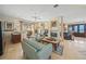 Light and airy living room with comfortable sofas and a fireplace at 213 The Esplanade S, Venice, FL 34285