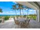 Enjoy ocean views from this covered patio at 213 The Esplanade S, Venice, FL 34285