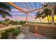 Ocean view patio with pergola and stairs down to beach at 213 The Esplanade S, Venice, FL 34285