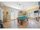 Game room with pool table and ocean views at 213 The Esplanade S, Venice, FL 34285