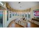 Ocean-view sitting room with comfy seating and sunset views at 213 The Esplanade S, Venice, FL 34285