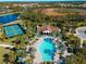 Community pool and clubhouse with pickleball courts at 224 Ariano Ave, Nokomis, FL 34275