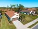Aerial view of a house and surrounding neighborhood at 224 Ariano Ave, Nokomis, FL 34275